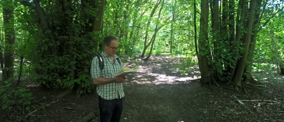 Peter Fiennes Reading Beneath Lime Trees In Wimbledon Wood